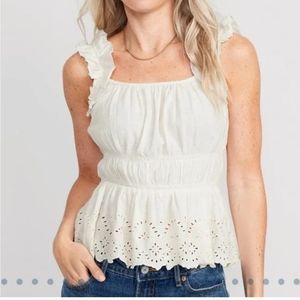 Sleeveless waist-defined, ruffle trim, embroidered babydoll blouse